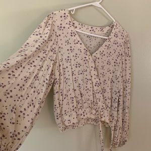 White puffy sleeved floral shirt purple flowers, tie waist